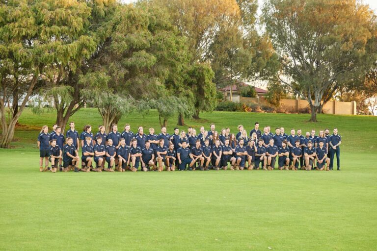 The Smartfix team lined up on a Perth oval